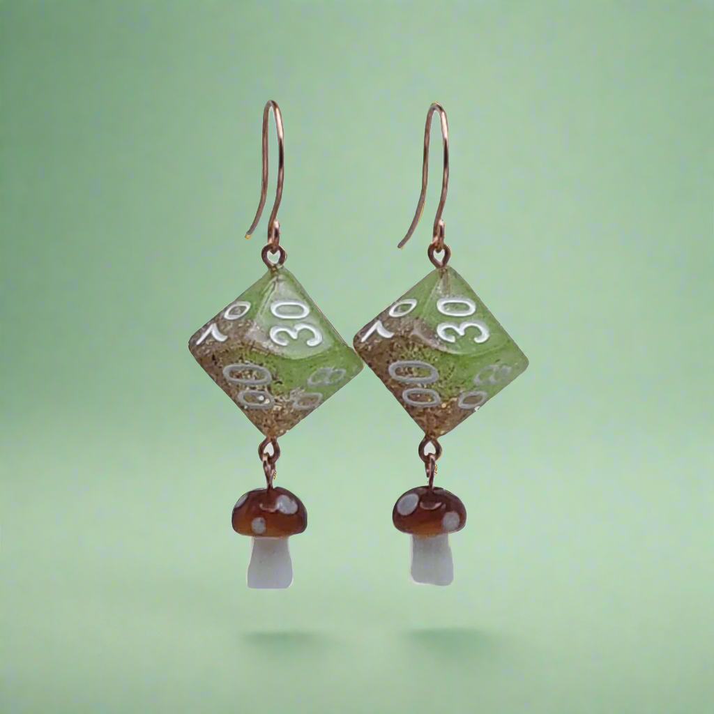 Cottagecore Style Dice Earrings. Green and Brown with white numbers with white and brown spotted mushroom accents.